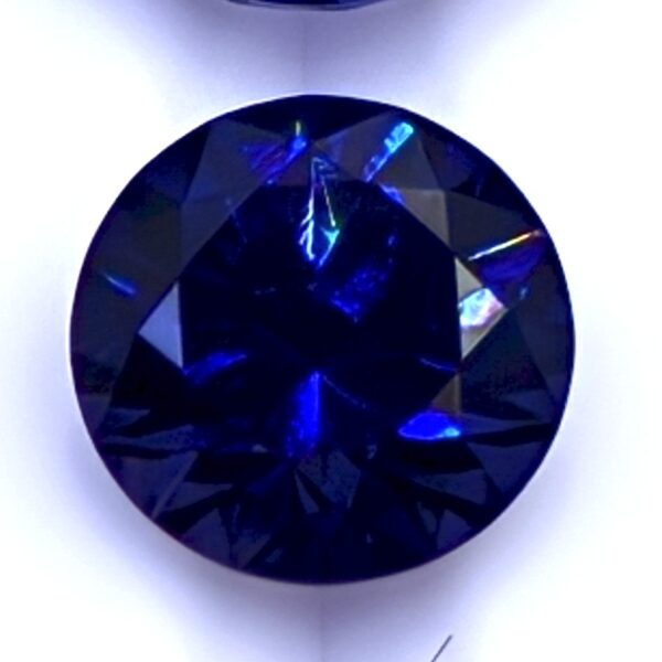 Benitoite .30 CT. Round Brilliant Cut Gemstone Faceted Rare Crystal