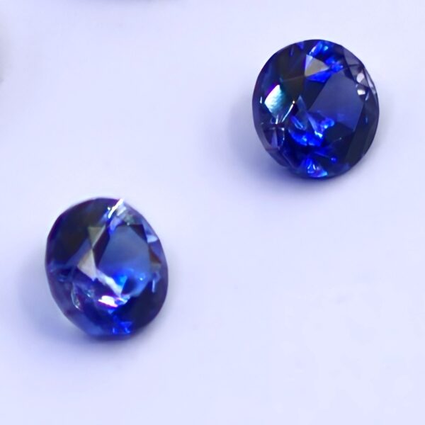 Benitoite .18 CTW. Faceted Gemstone Pair Round Brilliants