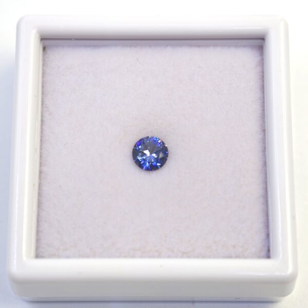 Benitoite .61 CT. Round Brilliant Cut Gemstone Faceted Rare Crystal